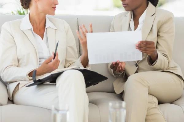 Businesswomen meeting together on the sofa Businesswomen meeting together on the sofa